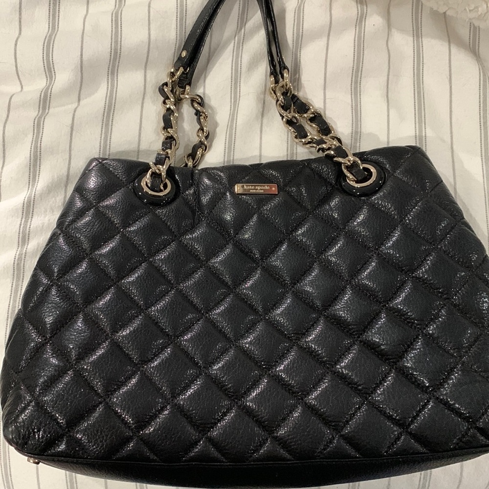 Quilted Kate Spade black leather with prime interior